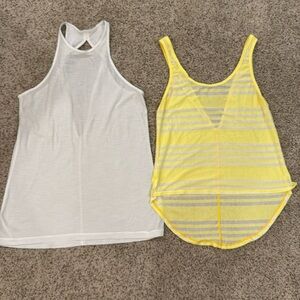 Lululemon Tanks X 2 white and yellow stripe. Unsure of the names. Size 6.